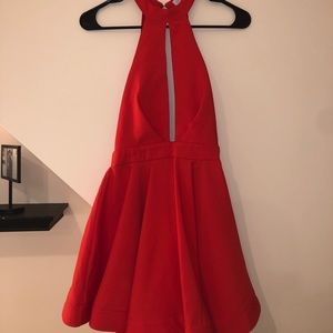Red unworn dress. Halter at the top